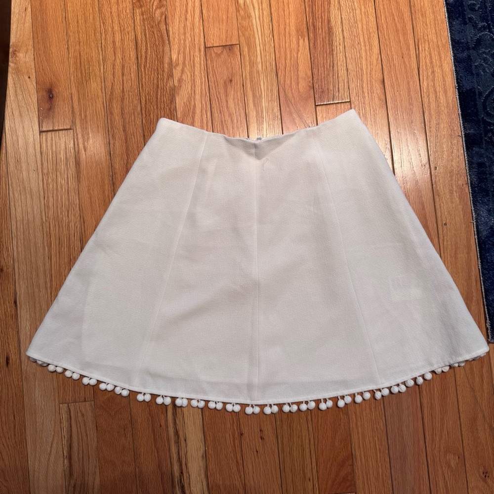 Club Monaco Elegant white Skirt with Pom-Pom Trim